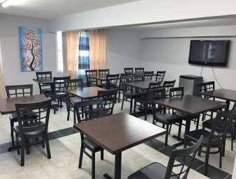 Travelodge By Wyndham Rosetown Ресторан фото